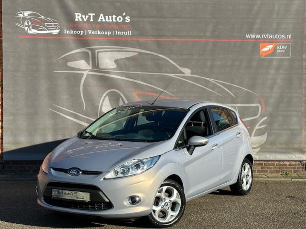 Ford Fiesta - 1.25 Titanium Dealeronderhouden,1ste eigenaar,Airco,Garantie. - AutoWereld.nl