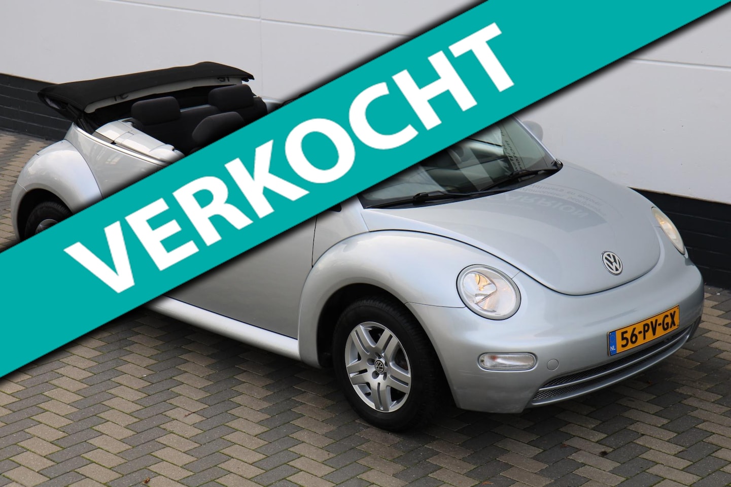 Volkswagen New Beetle Cabriolet - Elektrische kap weinig km's - AutoWereld.nl