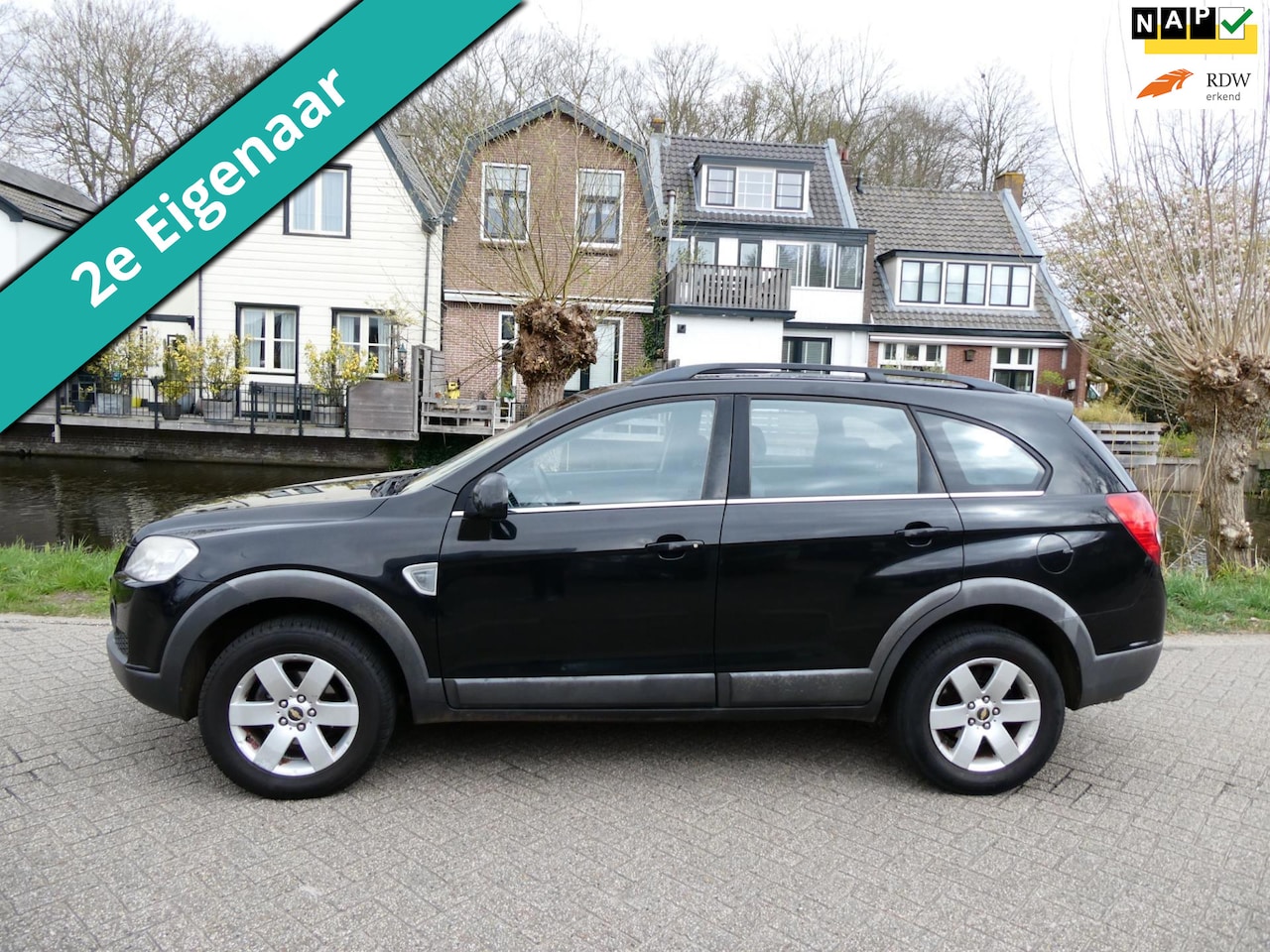 Chevrolet Captiva - 2.4i Style 2WD 7-Persoons 2e eig. Trekhaak 1500kg Airco - AutoWereld.nl