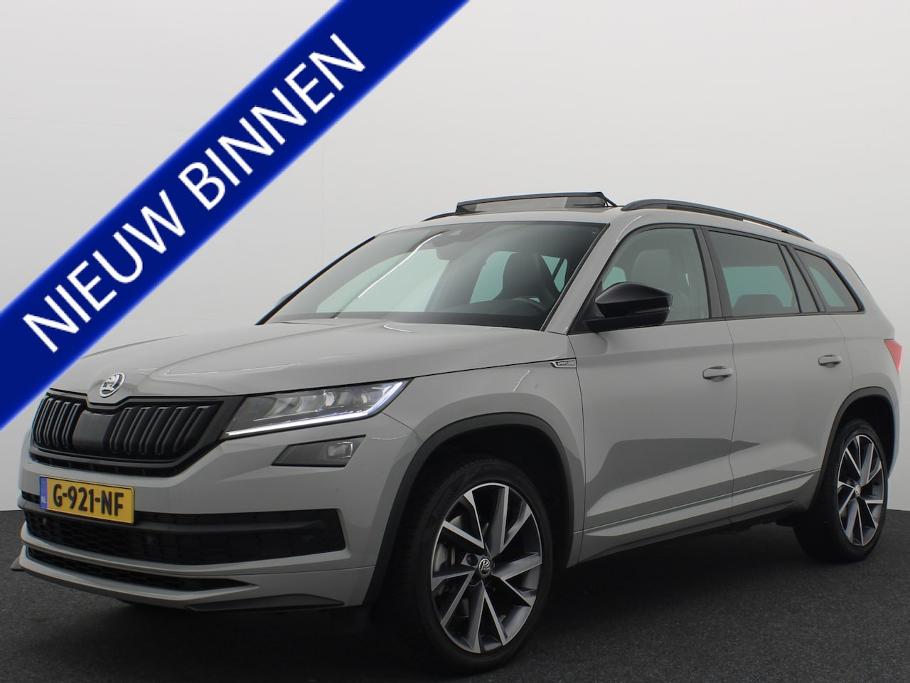 Skoda Kodiaq - 2.0 TSI 4x4 Sportline Business TREKHAAK / PANORAMADAK / FULL LED / CAMERA / CANTON / KEYLE - AutoWereld.nl