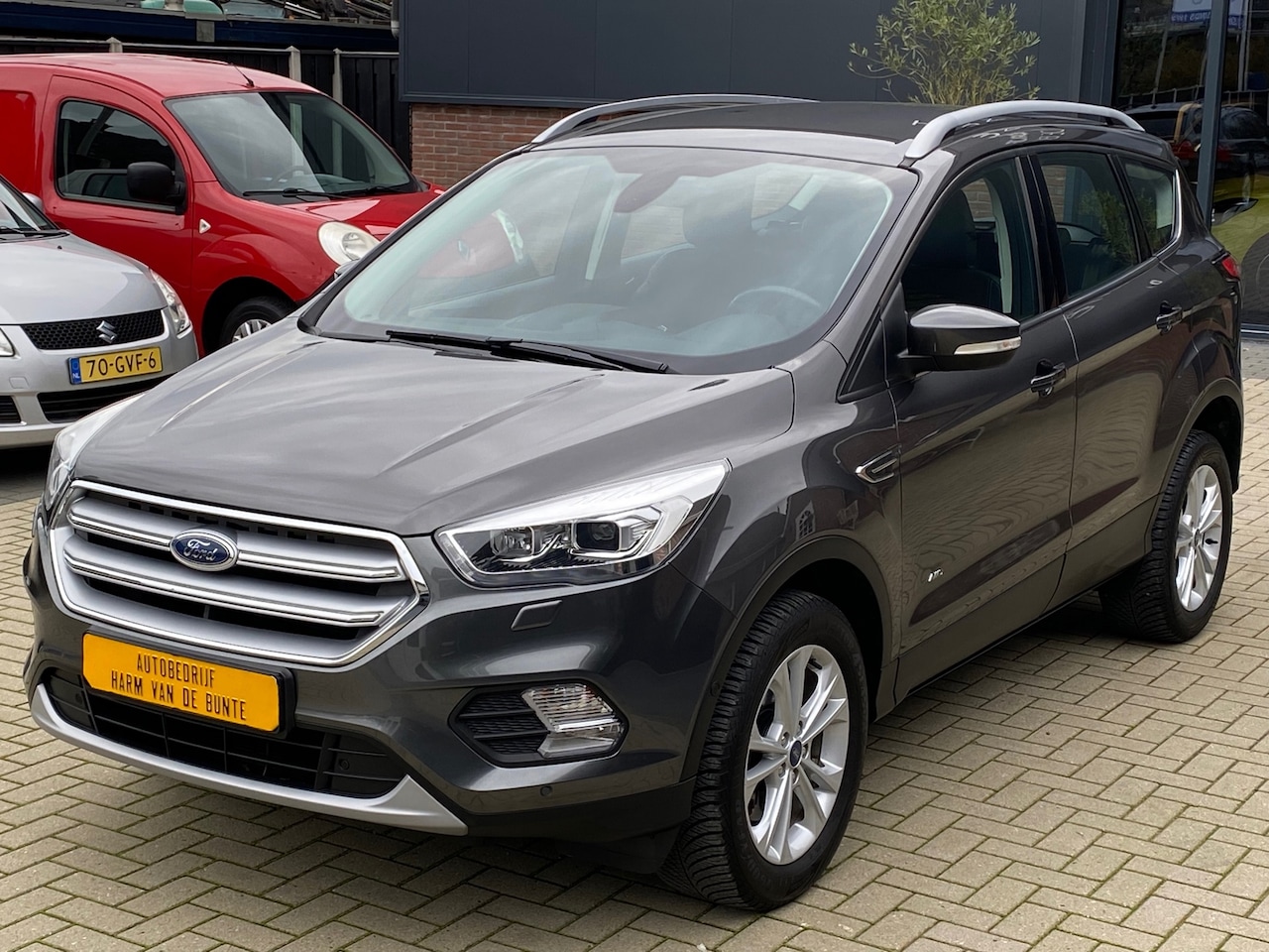 Ford Kuga - 1.5 EcoBoost 182 PK AWD Titanium NIEUWSTAAT LED XENON NAVI CRUISE CLIMA PDC - AutoWereld.nl