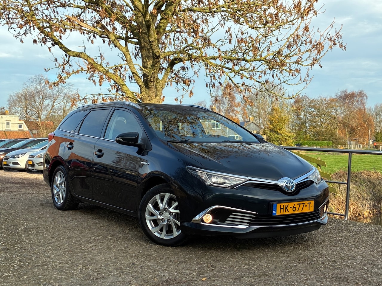 Toyota Auris Touring Sports - 1.8 Hybrid | Panodak + Leder + Xenon + Navi nu €8.975,-!! - AutoWereld.nl