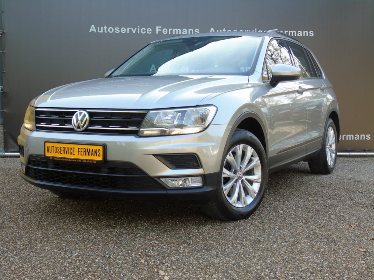 Volkswagen Tiguan - 1.4 TSI 125 PK - PDC - Climate - Winterpakket - Trekhaak - AutoWereld.nl