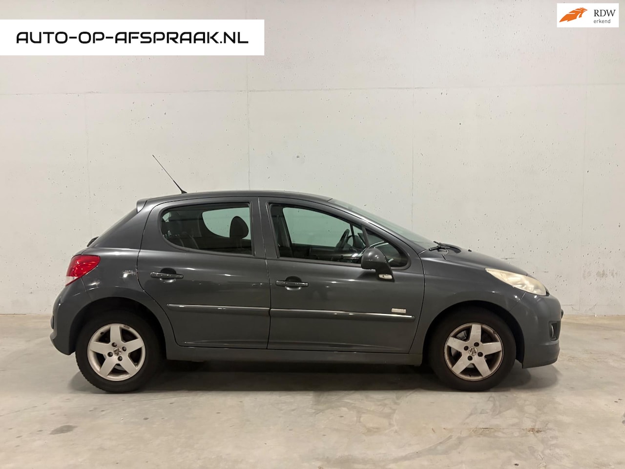 Peugeot 207 - 1.4 VTi Millesim 200 5drs. Airco APK NAP - AutoWereld.nl