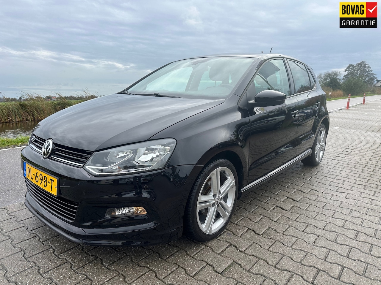 Volkswagen Polo - 1.2 TSI Comfortline Business R-line, Carplay, Cruisecontrol, PDC, Bluetooth, - AutoWereld.nl