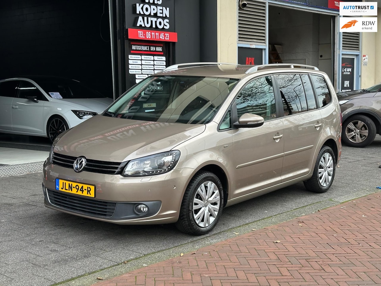 Volkswagen Touran - 1.4 TSI Highline Aut Clima Stoelverwarming PDC - AutoWereld.nl