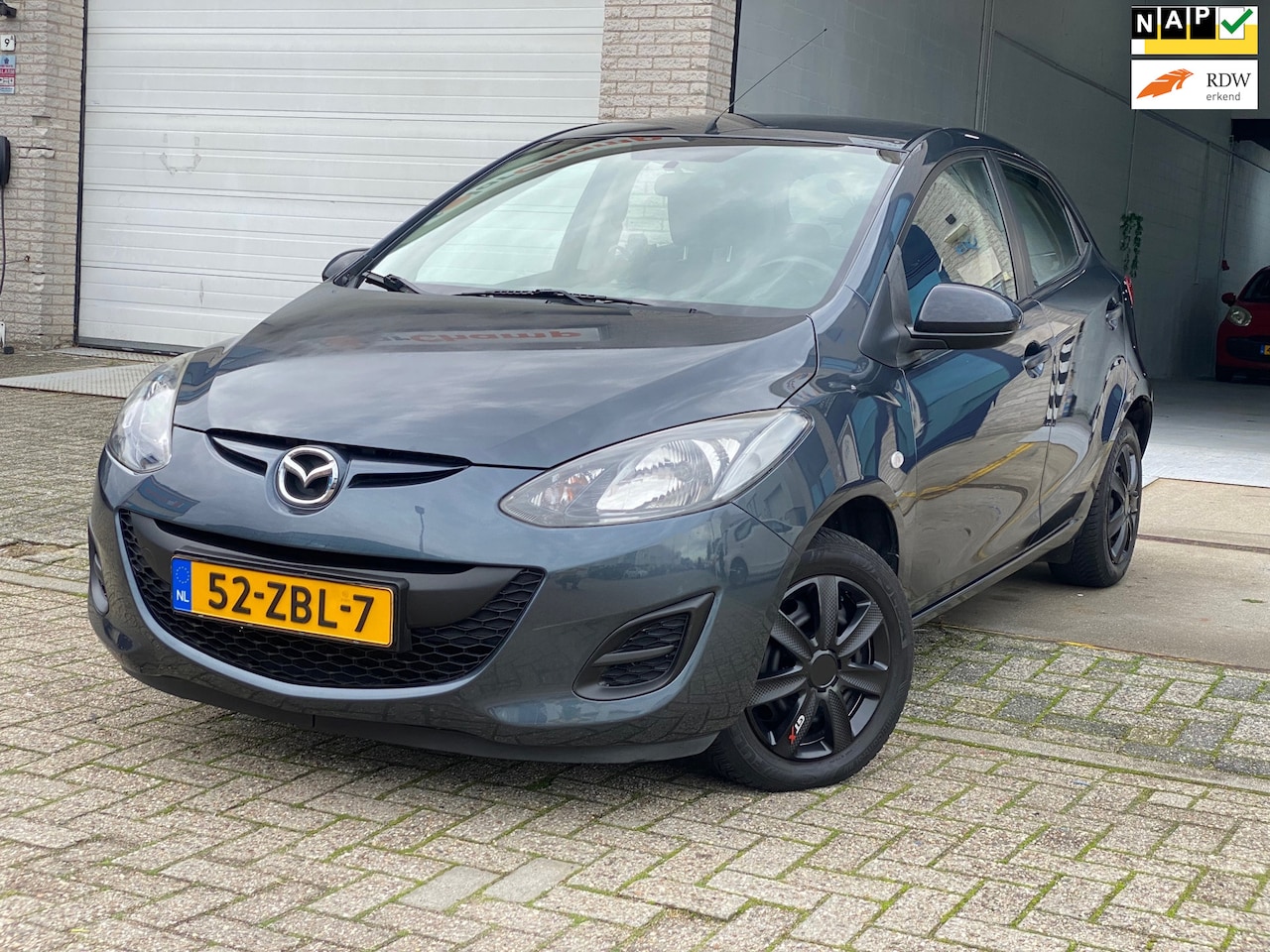 Mazda 2 - 1.3 Cool/ LPG/ nap/ 2e EIG/ dealeronderhouden/ 1jaar apk/ airco/ trekhaak/ zeer nette auto - AutoWereld.nl