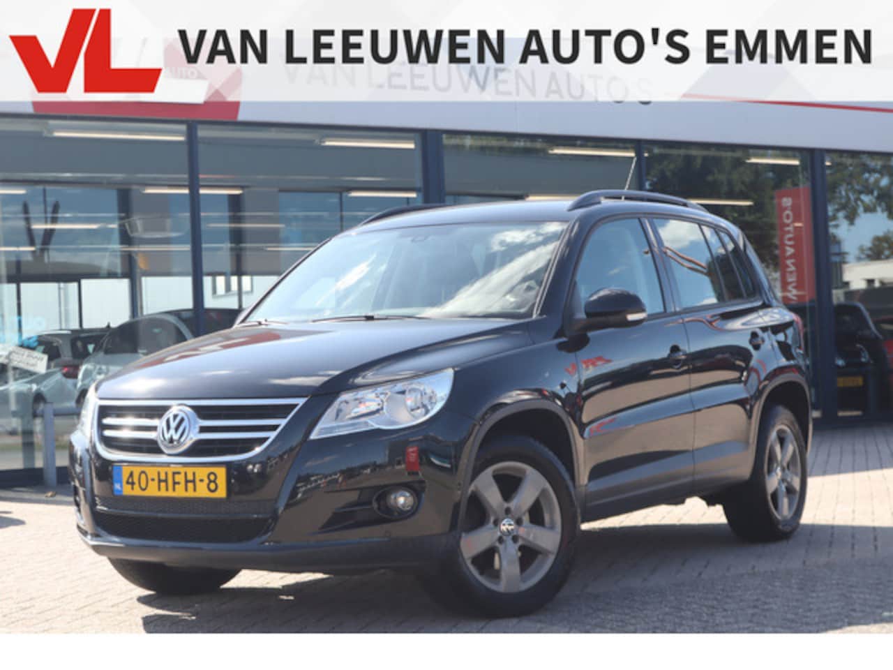 Volkswagen Tiguan - 1.4 TSI Comfort&Design 4Motion | Sensoren | Trekhaak | Clima - AutoWereld.nl