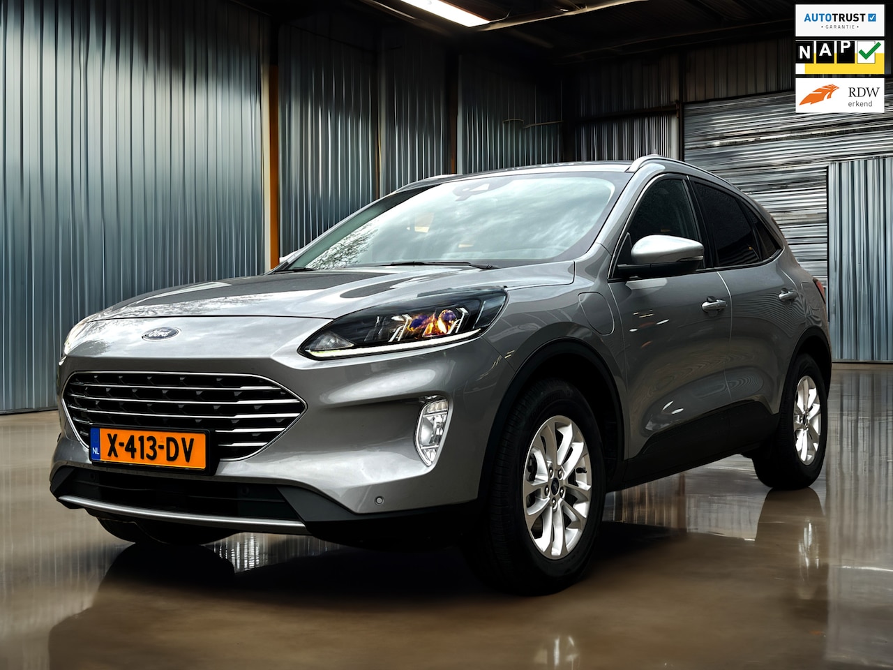 Ford Kuga - 2.5 PHEV Titanium Carplay_Camera_1ste eign - AutoWereld.nl