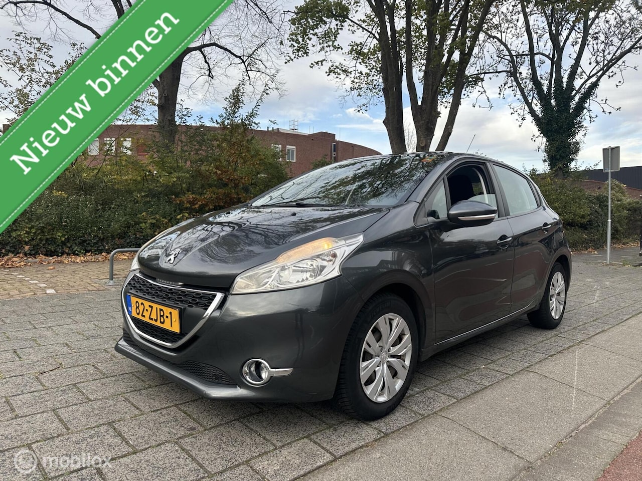 Peugeot 208 - 1.2 VTi Envy/5-Drs/Airco/Cruise/Navi/PDC/NAP - AutoWereld.nl
