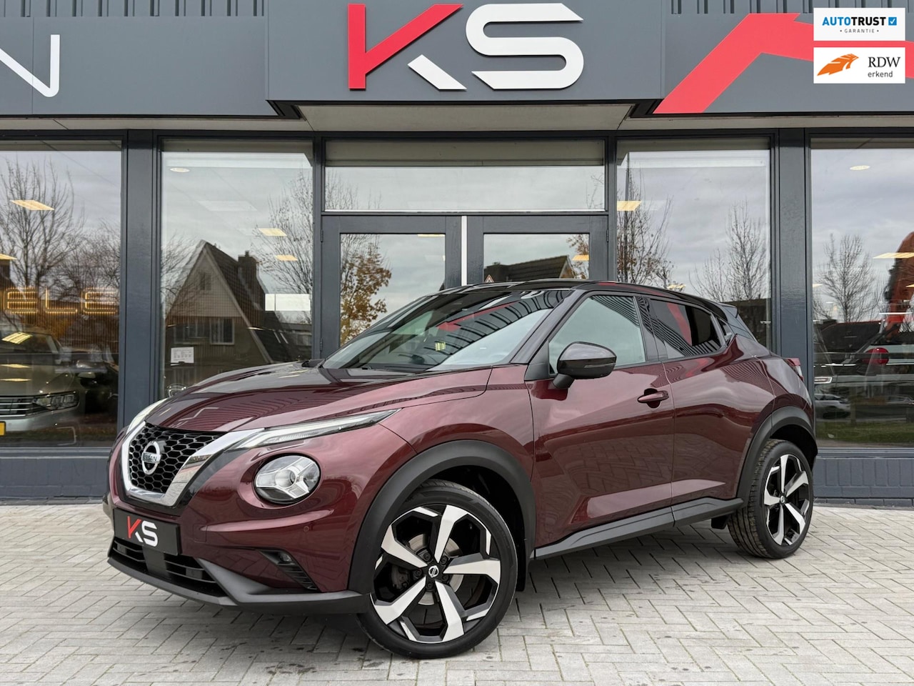 Nissan Juke - 1.0 DIG-T Tekna Automaat 360 camera Carplay Navi - AutoWereld.nl