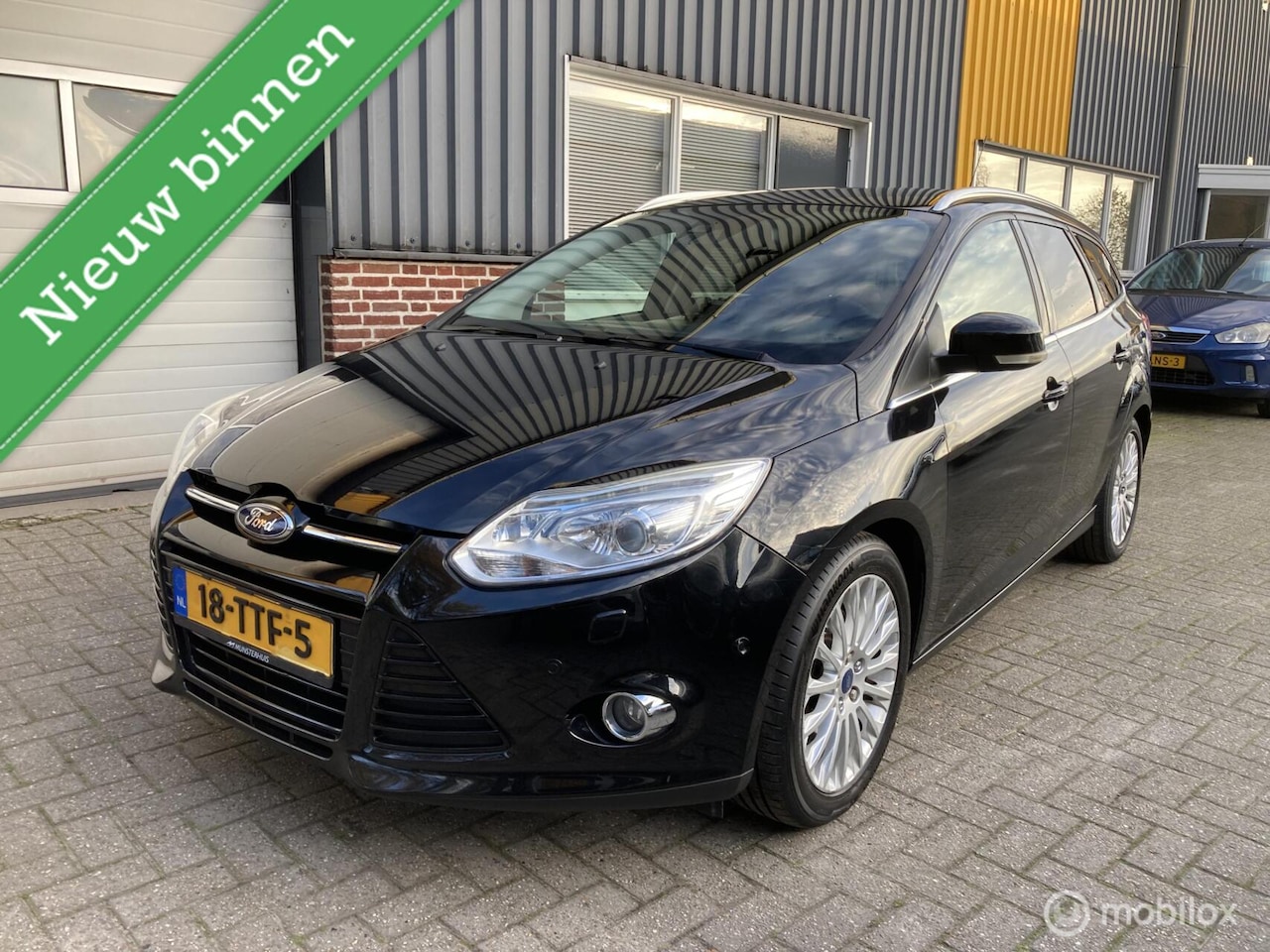 Ford Focus Wagon - 1.0 EcoBoost Titanium TREKHAAK! - AutoWereld.nl