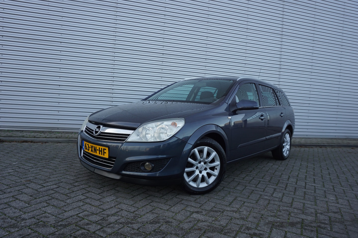 Opel Astra Wagon - 1.6 Temptation Airco / Cruise / Elektr. ramen / Trekhaak / Lm velgen / NAP - AutoWereld.nl