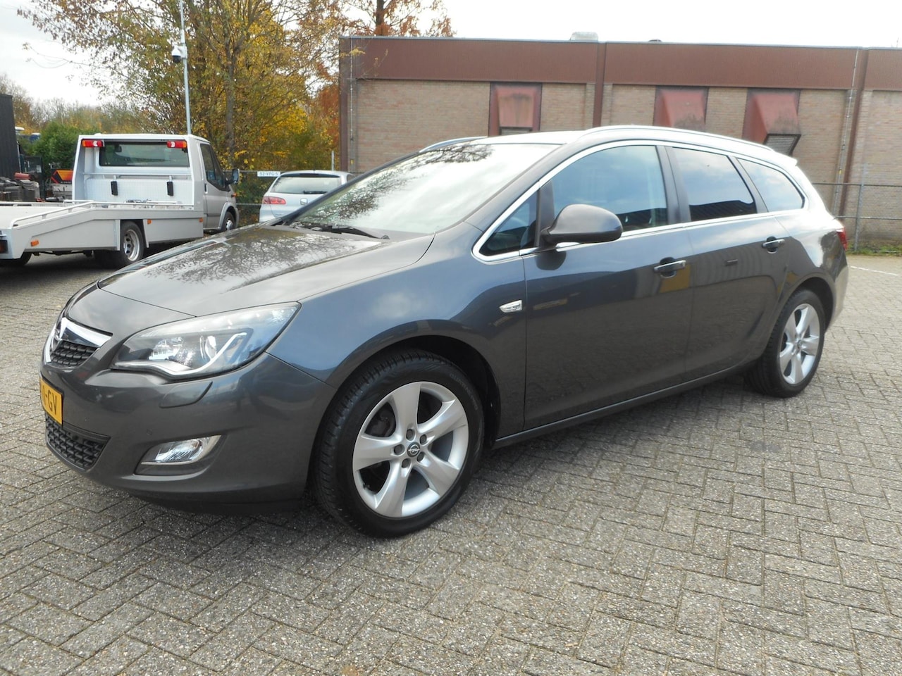 Opel Astra Sports Tourer - 1.4 Turbo Sport 1.4 Turbo Sport - AutoWereld.nl
