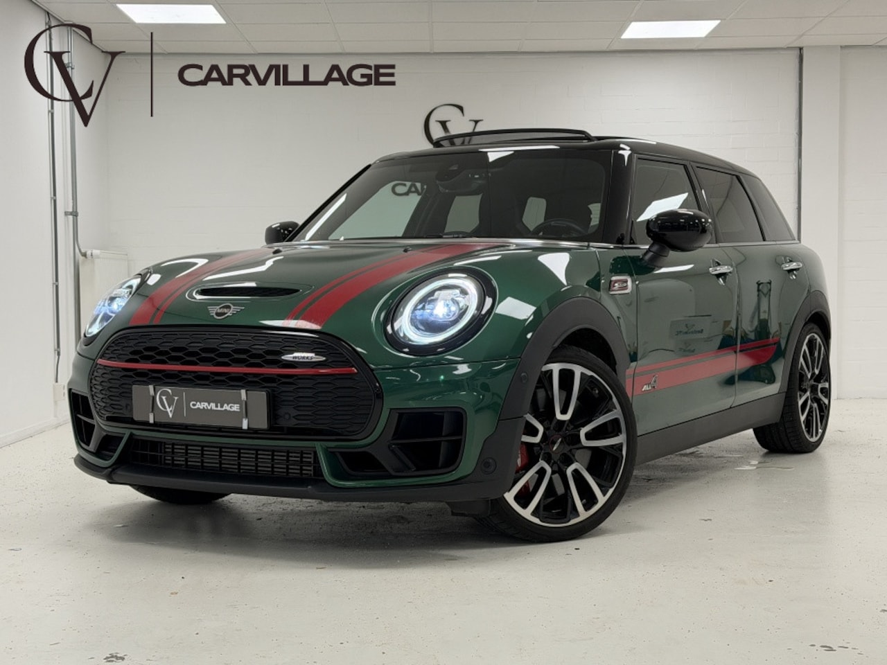 MINI Clubman - 2.0 JCW ALL4 | British Racing Green | Harman/Kardon | - AutoWereld.nl