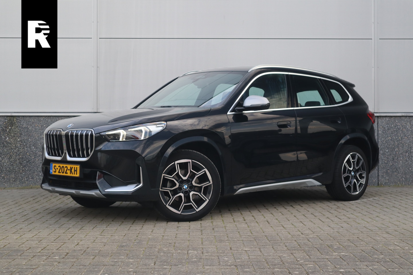 BMW X1 - sDrive18i X-Line / Trekhaak / Adaptieve Cruise / 19inch / Camera / - AutoWereld.nl