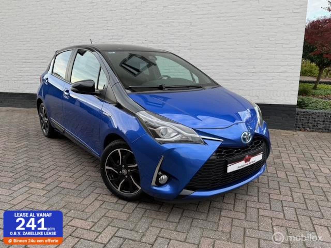 Toyota Yaris - 1.5 Hybrid Bi-Tone | Nav | Camera | Luxe - AutoWereld.nl