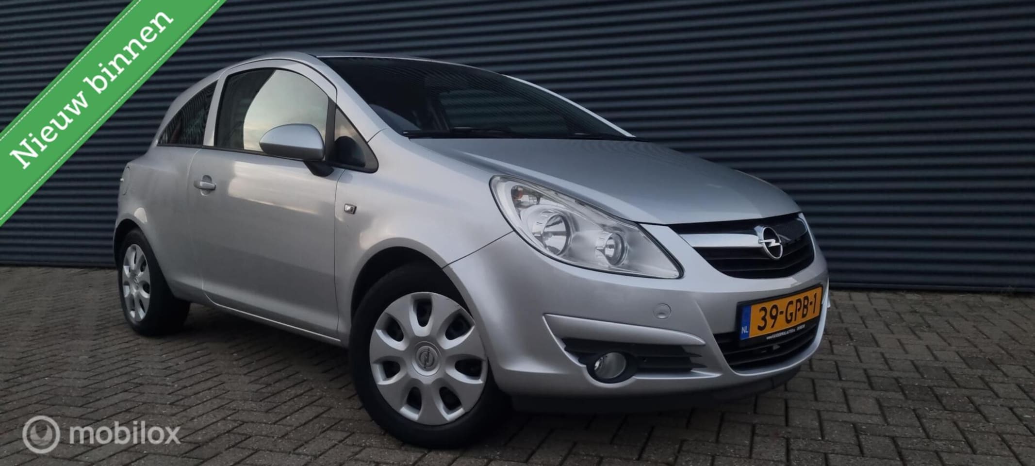 Opel Corsa - 1.2-16V Enjoy AUTOMAAT/AIRCO - AutoWereld.nl