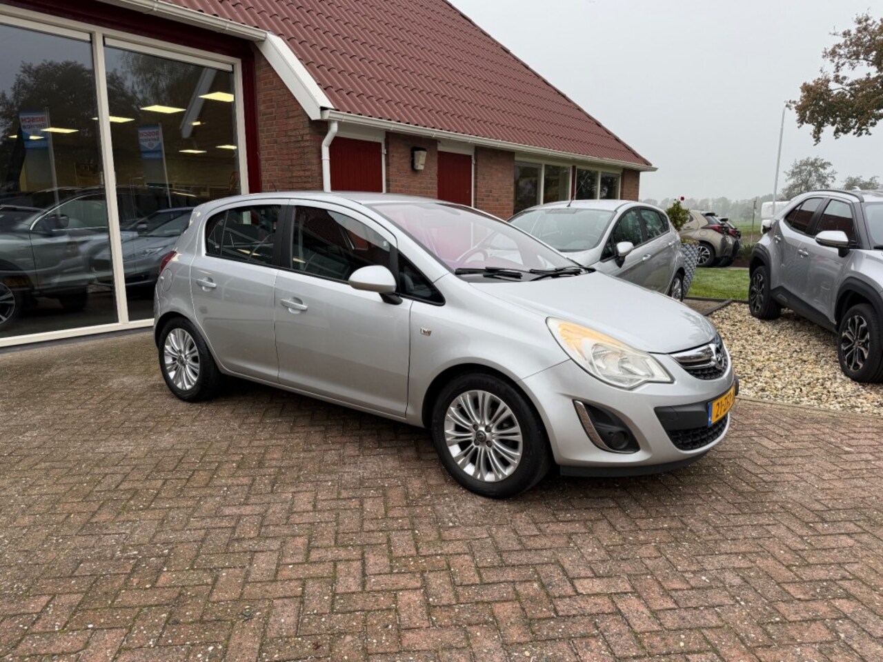 Opel Corsa - 1.2-16V COSMO 5-DRS MET SLECHTS 82.544 KM!! AIRCO/TREKHAAK/CRUISE - AutoWereld.nl