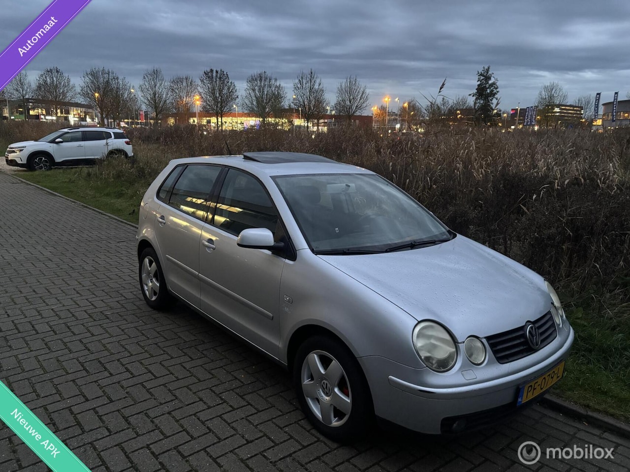 Volkswagen Polo - 1.4-16V Highline AUTOMAAT|PANORAMADAK|NWE APK|ELEK PAKKET|LM VELGEN|NETTE AUTO - AutoWereld.nl