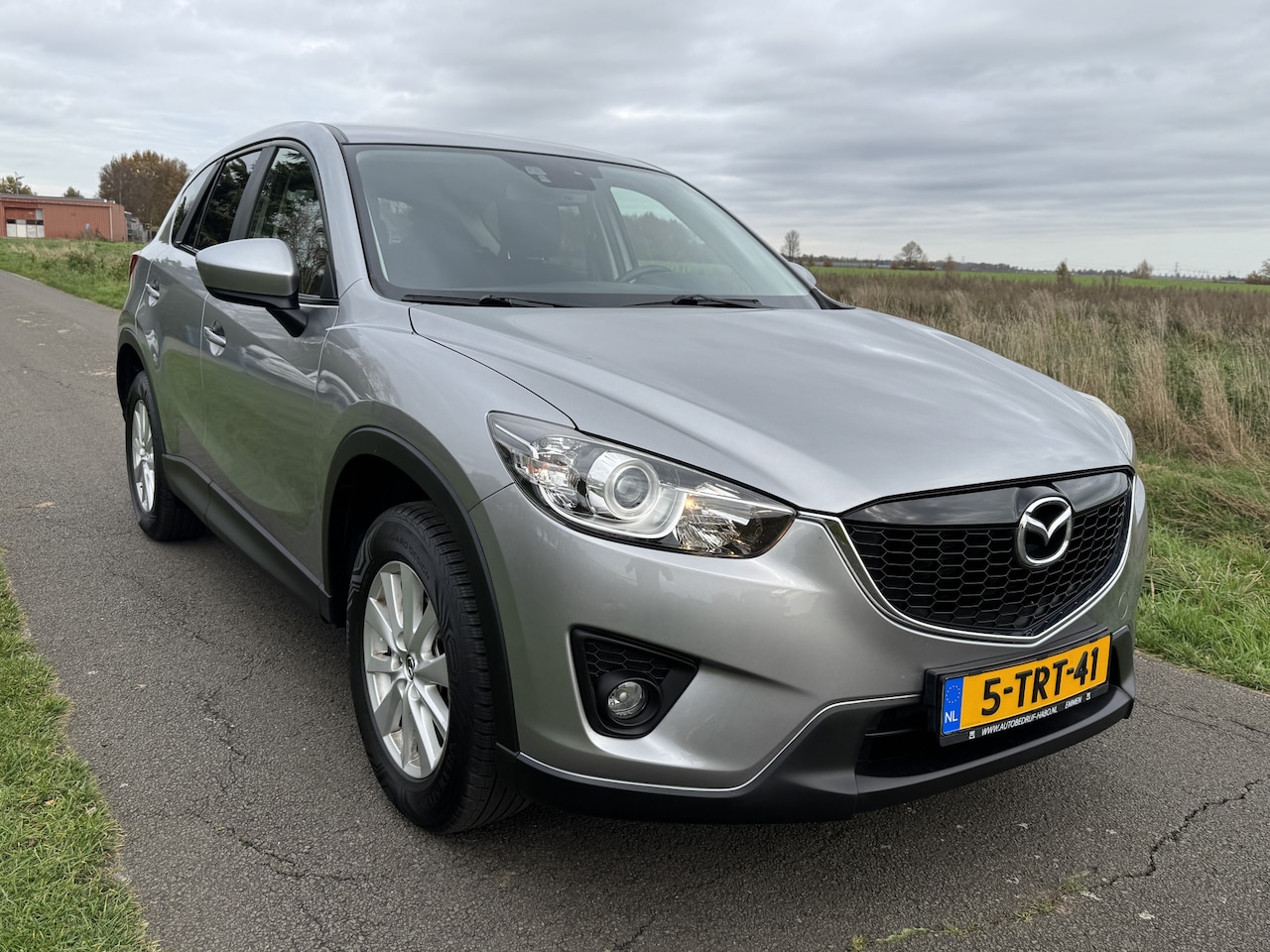 Mazda CX-5 - 2.0 Skylease 2WD NAVI/ECC/CRUISE/ NETTE AUTO!! - AutoWereld.nl