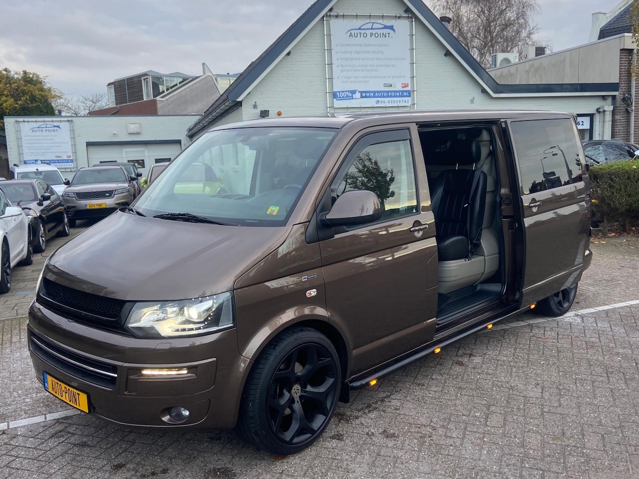 Volkswagen Transporter - 2.0 TDI 5-ZITS/NAV/XENON/AUT/LEER/2XSCHUIFDEUR - AutoWereld.nl