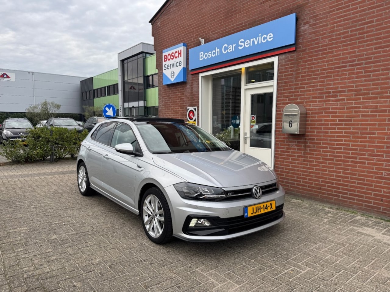 Volkswagen Polo - 1.0 TSI 85kW R-Line Highline Panoramadak - AutoWereld.nl
