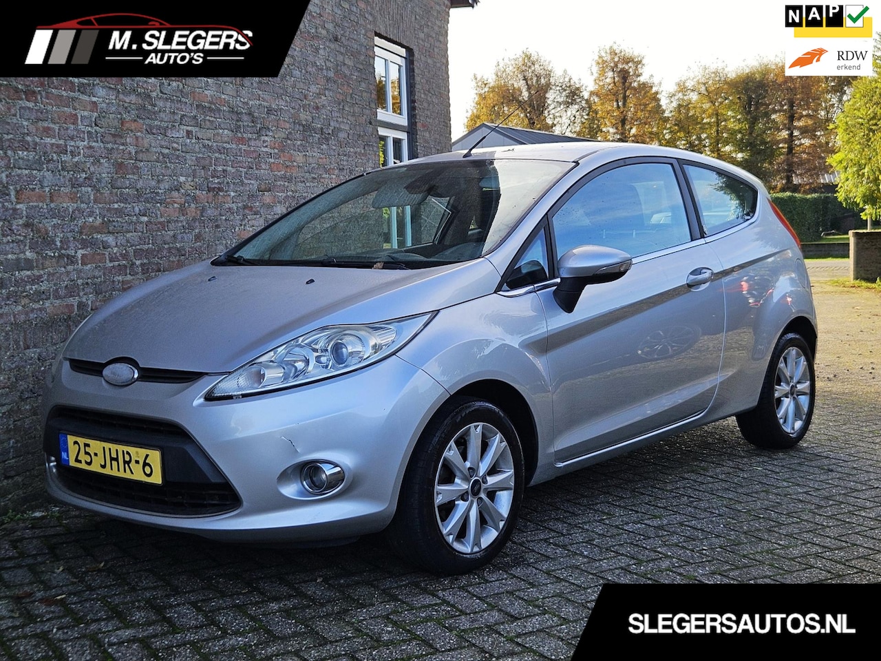Ford Fiesta - 1.25 Ghia*Airco*Lm velg*Nette auto*NAP - AutoWereld.nl