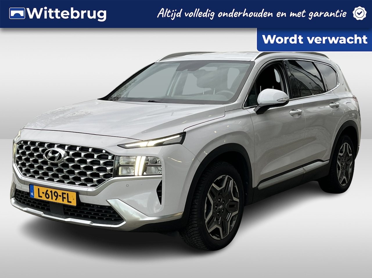 Hyundai Santa Fe - 1.6 T-GDI HEV Comfort Smart TREKHAAK | NAVIGATIE | ALL SEASON BANDEN - AutoWereld.nl