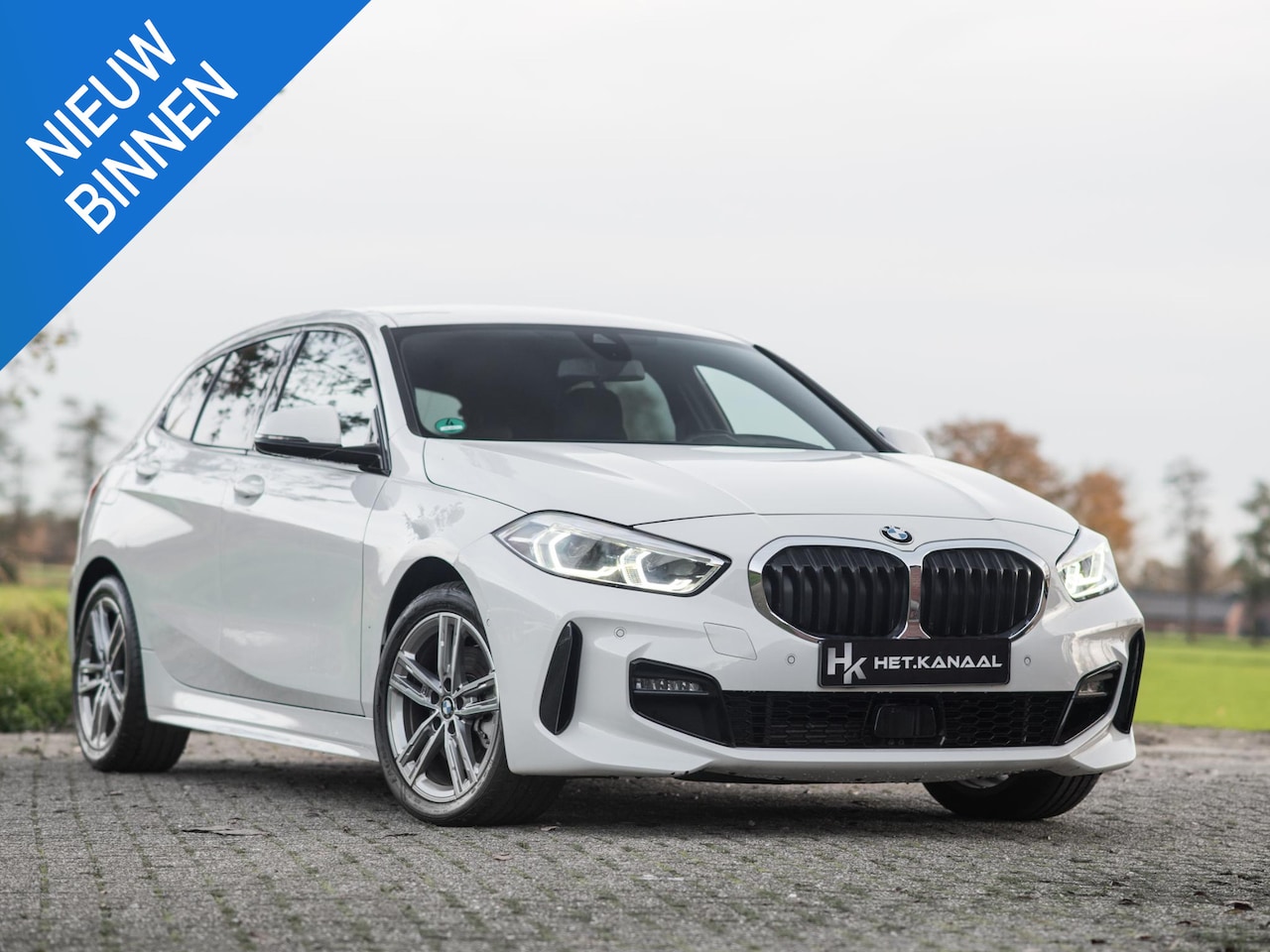 BMW 1-serie - 118i High Executive M-Pakket Stoelv Cam Cruise - AutoWereld.nl