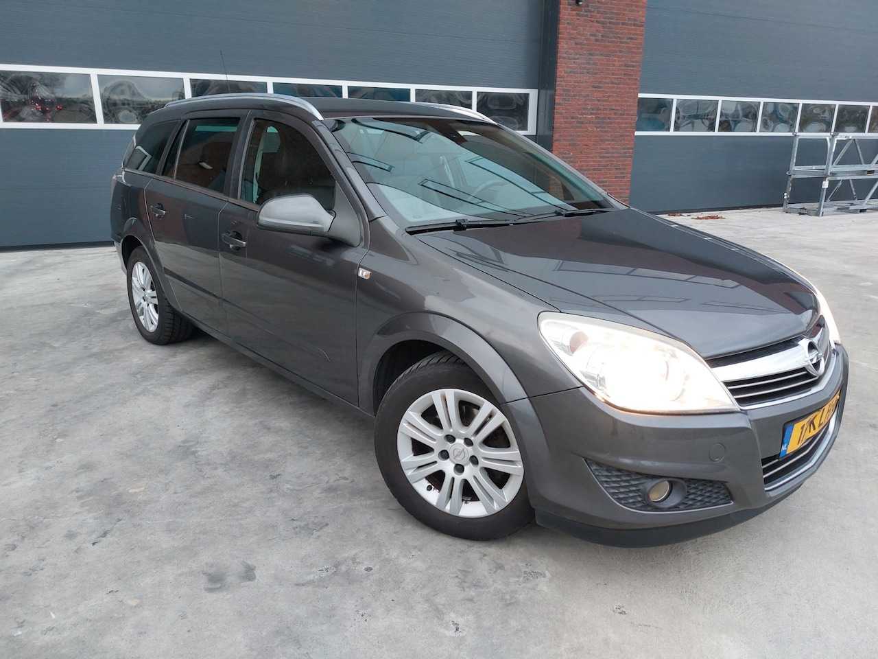 Opel Astra Wagon - 1.6 Cosmo Airco/ECC Leer LMV Trekhaak - AutoWereld.nl