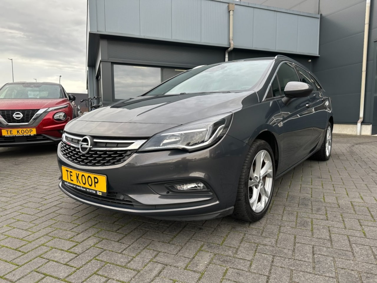 Opel Astra - Sportstourer 1.4 Turbo Navigatie 1ste eigenaar - AutoWereld.nl