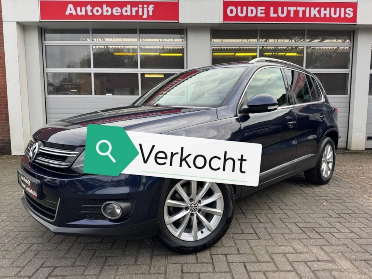 Volkswagen Tiguan - 1.4TSI 125PK Lounge Camera Navi Trekhaak - AutoWereld.nl