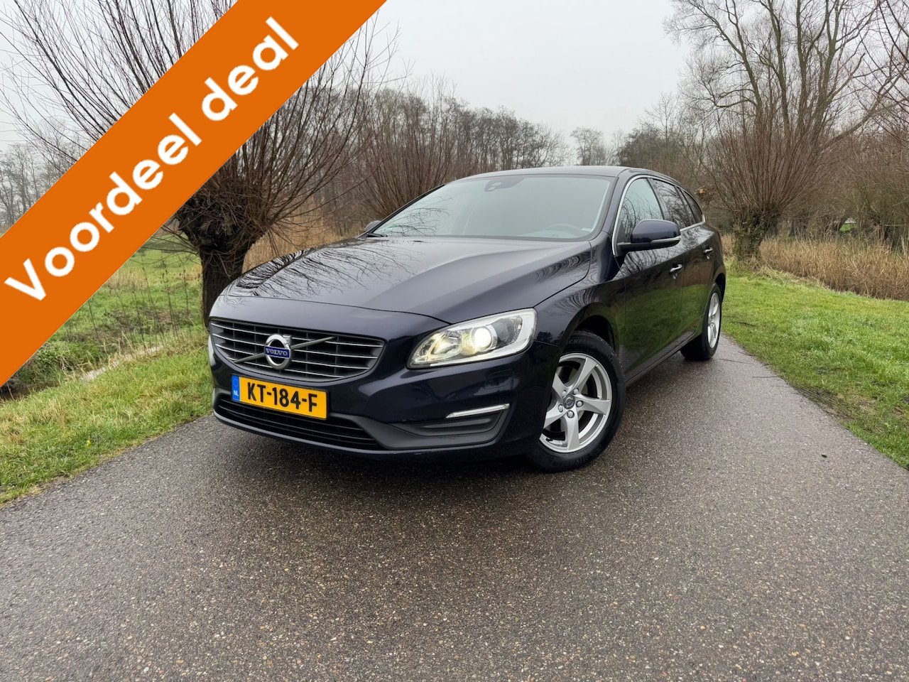 Volvo V60 - 2.0 D2 Nordic+ / Airco / Navi / Cruise Control / Half Leder / Volledig Onderh. Distr. Verv - AutoWereld.nl