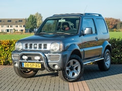 Suzuki Jimny - 1.3 Exclusive | Volleder | Stoelverwarming | Airco | Pano roldak | Afn Trekhaak | Chroom p