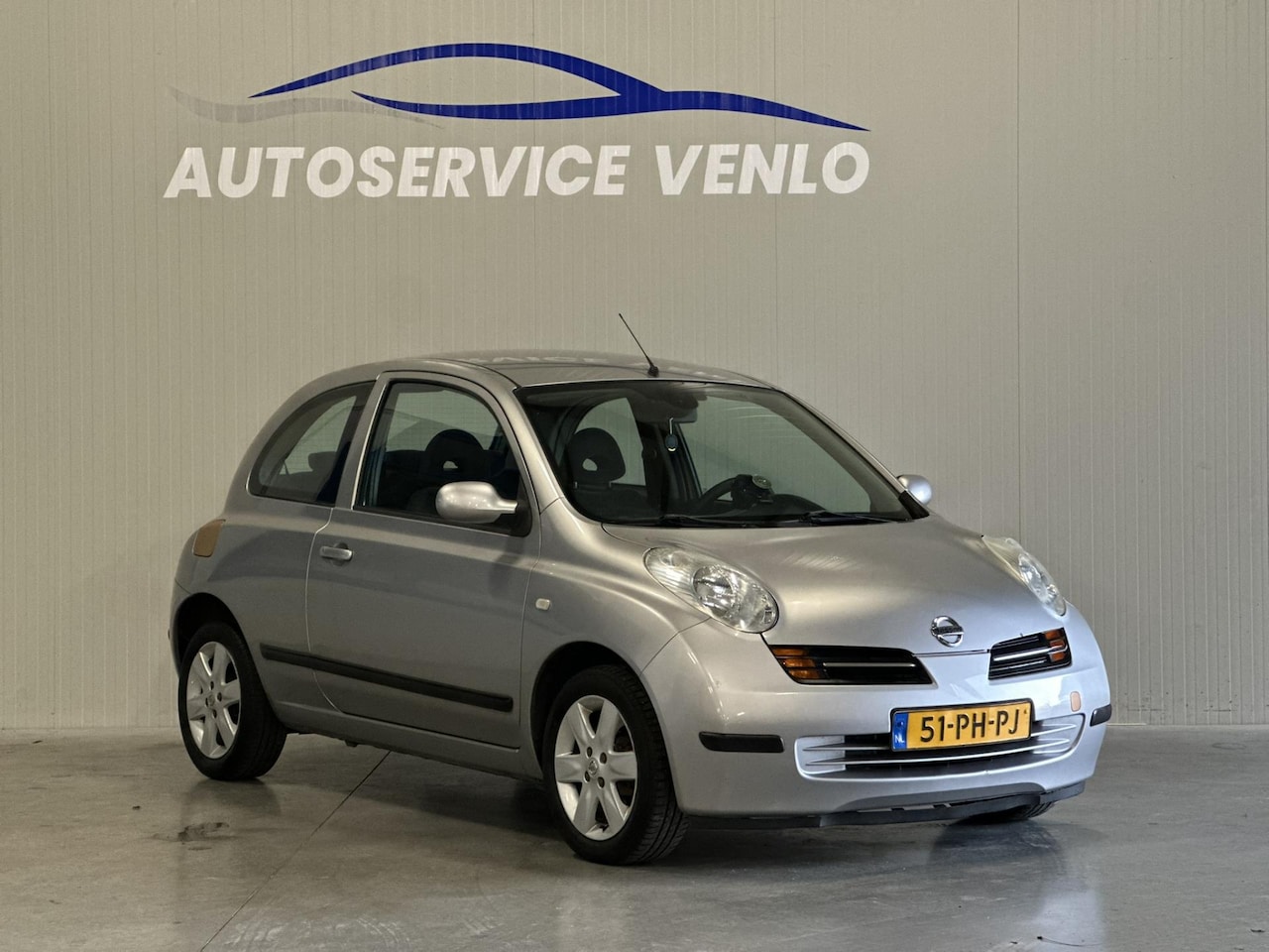 Nissan Micra - 1.2 Tekna Edition Grijs | Climatronic | Electrische ramen | - AutoWereld.nl