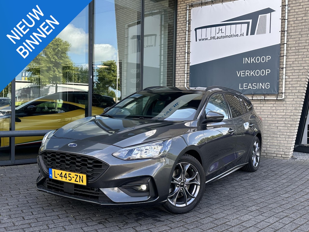 Ford Focus Wagon - 1.0 EcoBoost ST Line*ECC*CRUISE*NAVI*CAM* - AutoWereld.nl