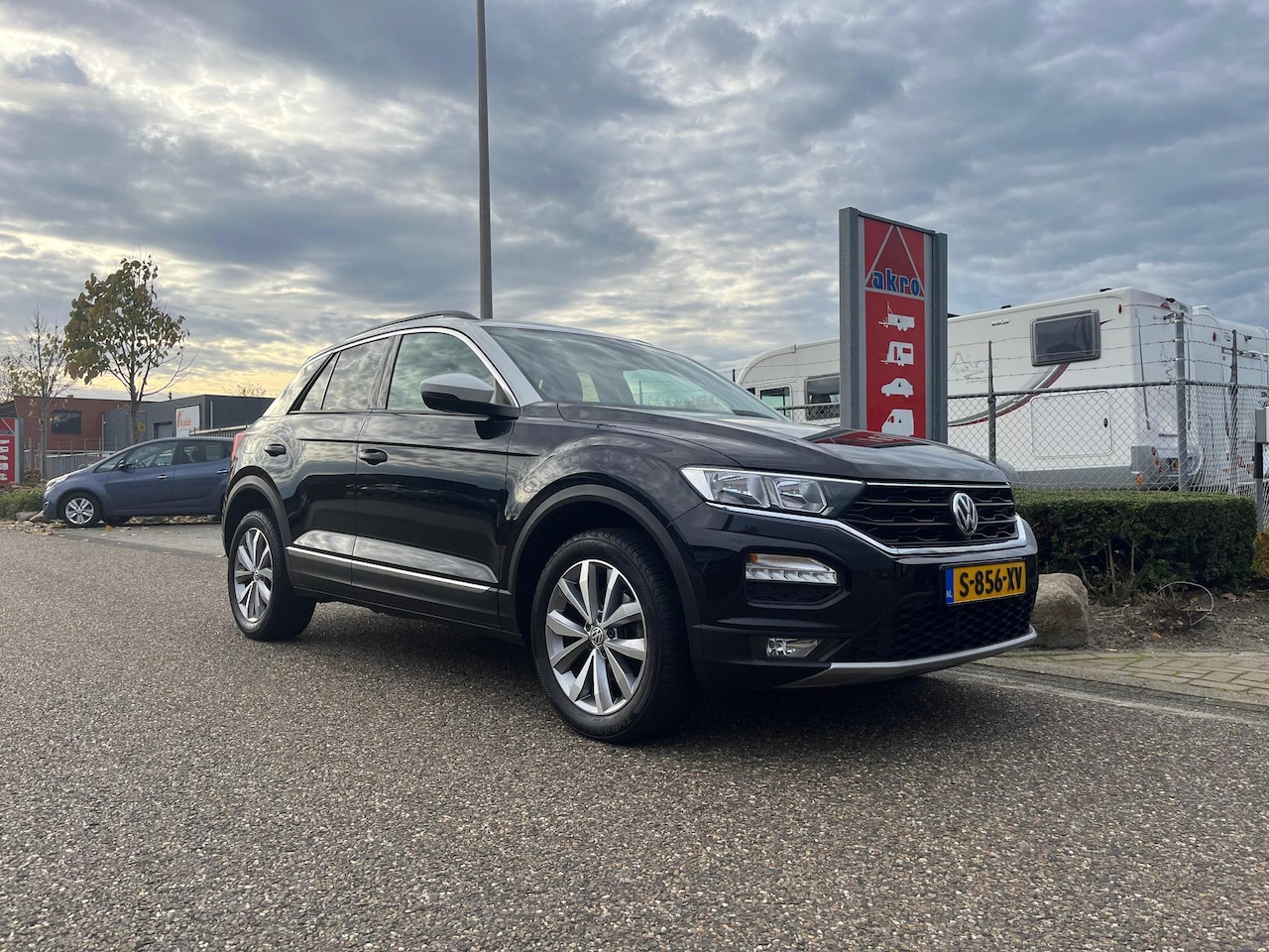 Volkswagen T-Roc - 1.0 TSI Style | Wit dak | Adaptive Cruise Control | Carplay | Stoelverwarming - AutoWereld.nl