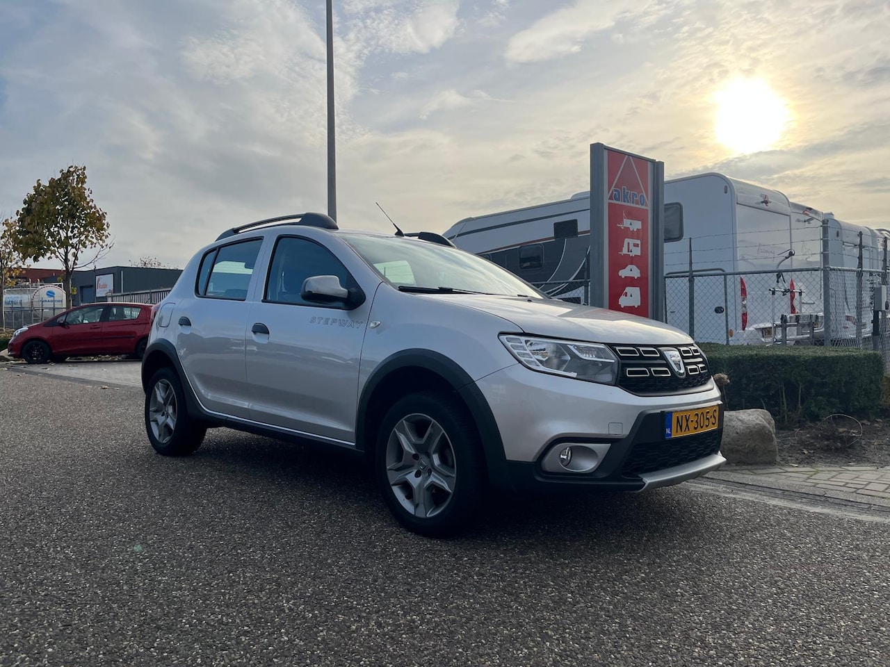 Dacia Sandero Stepway - 0.9 TCe Bi-Fuel SL | LPG | Trekhaak | Cruise Control | NAVI | Parkeersensoren | Airco - AutoWereld.nl