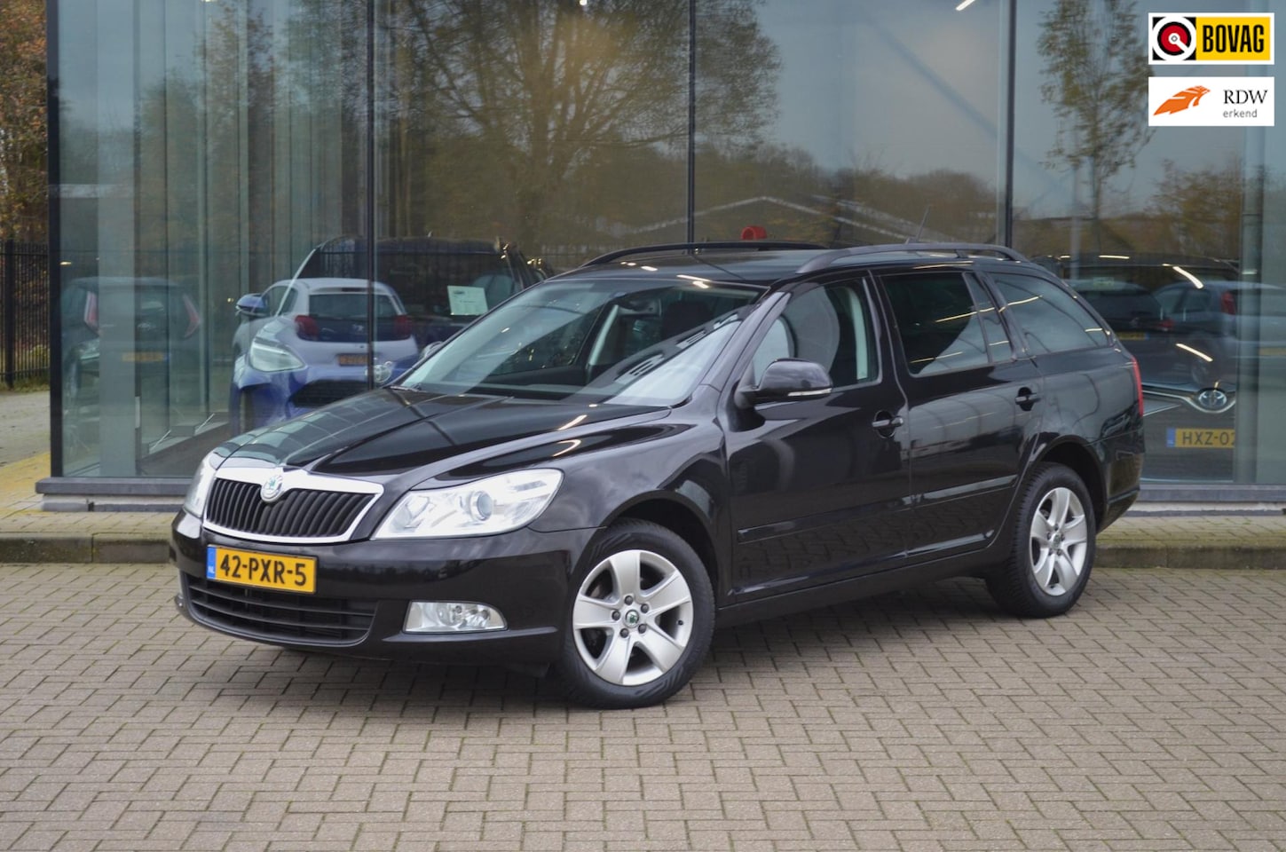 Skoda Octavia Combi - 1.2 TSI Ambition Business Line | Automaat | Navi | PDC | Trekhaak - AutoWereld.nl