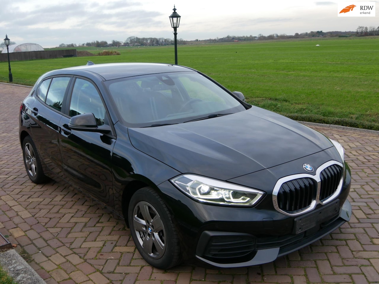 BMW 1-serie - 116d 85kW AUTOMAAT AC ** 13499 NETTO ** - AutoWereld.nl