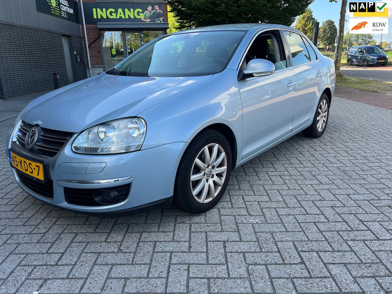 Volkswagen Jetta - 1.4 TSI '09 Clima/Navi/Lmv/NweKetting! - AutoWereld.nl