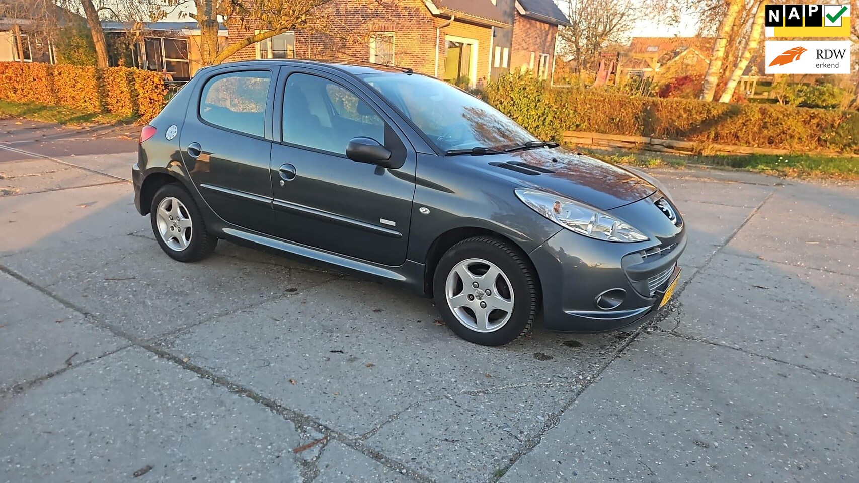 Peugeot 206 - 1.4 Millesim 200/ bj 2011/ airco/ 140.950 km - AutoWereld.nl