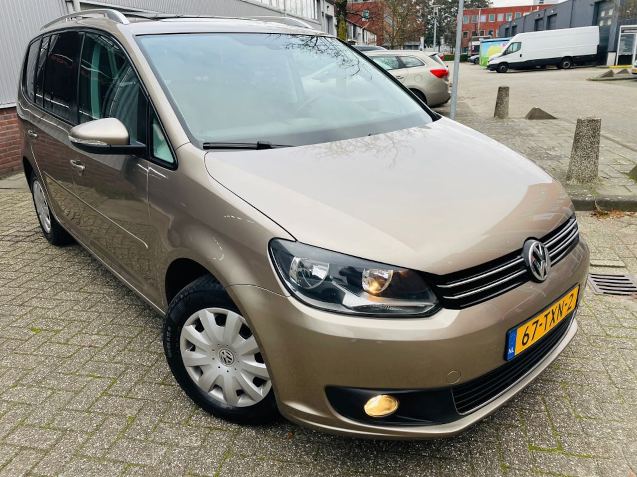 Volkswagen Touran - 1.2 TSI Comfortline Panormadak PDC KLIMA - AutoWereld.nl