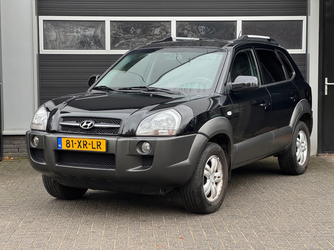 Hyundai Tucson - 2.0i Style Premium Stoelverwarming, Cruise, Climate Control, PDC, NAP - AutoWereld.nl