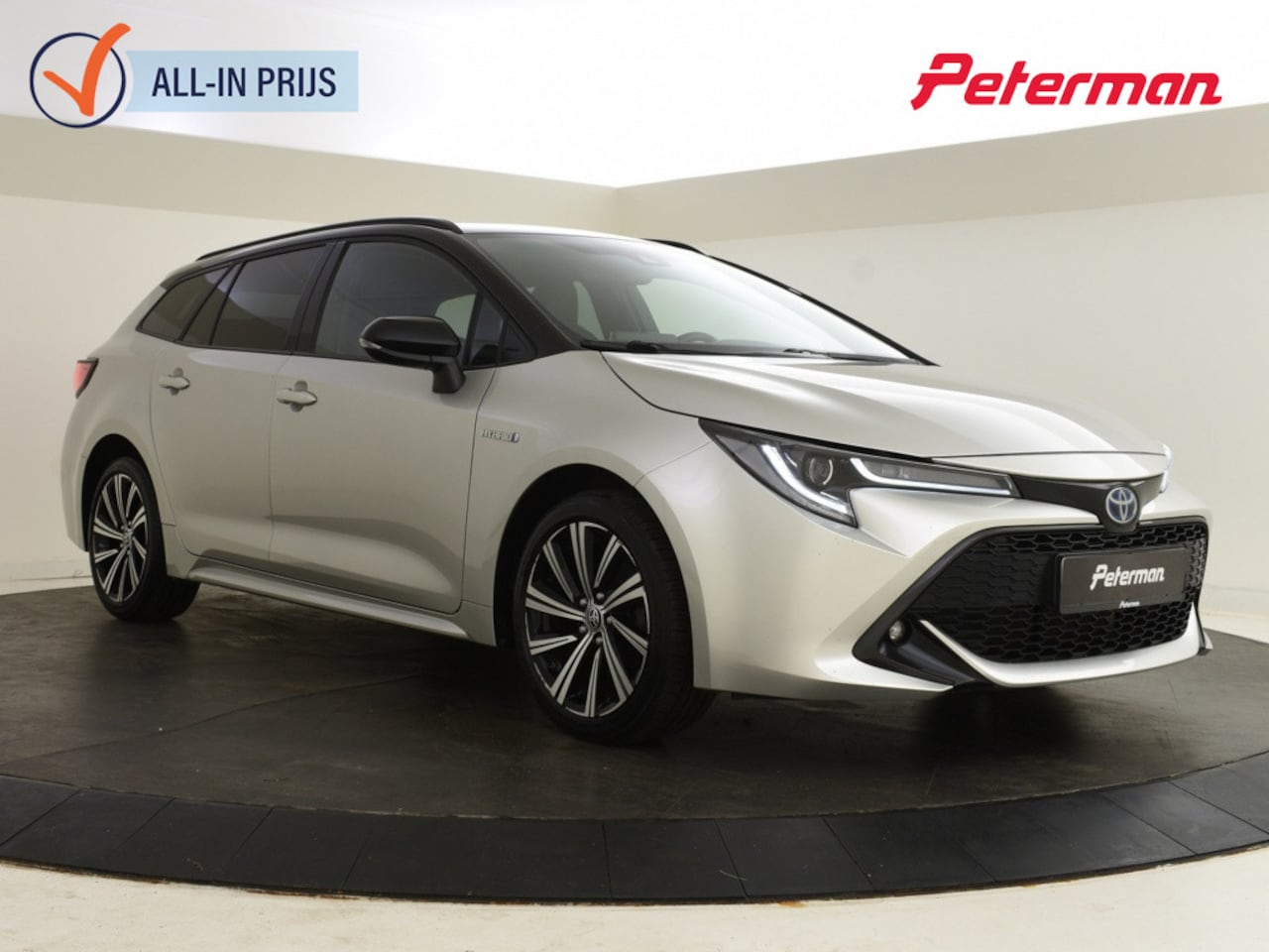 Toyota Corolla Touring Sports - 1.8 Hybrid Bi-tone | Stuur en Stoelverwarming | HUD | Electrisch - AutoWereld.nl