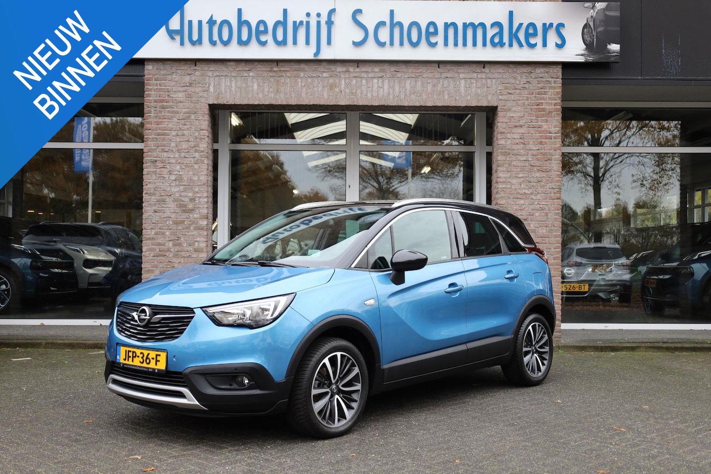 Opel Crossland X - 1.2 Turbo Online Edition HALF-LEER TREKHAAK CARPLAY HUD CRUISE CLIMA NAVI LANE-ASSIST PDC - AutoWereld.nl