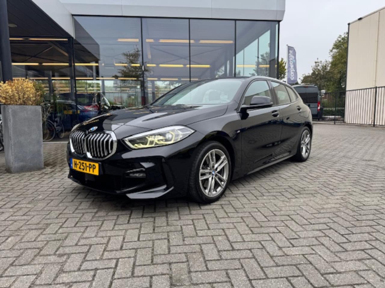 BMW 1-serie - (f40) 118i 140pk AUTOMAAT Corporate Executive M pakket interieur en exterieur - AutoWereld.nl