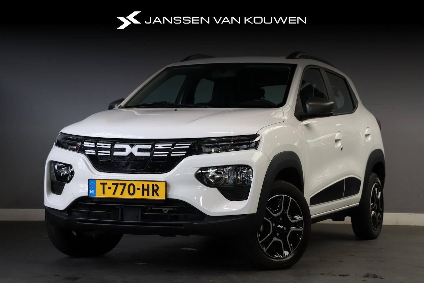 Dacia Spring - Expression 27 kWh Pr. Lease 219,- Navi Leder Camera Airco Parkeersensoren Cruise Control - AutoWereld.nl