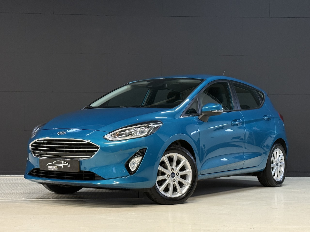 Ford Fiesta - 1.0 EcoBoost Titanium | Winterpakket | Park assist | Camera - AutoWereld.nl
